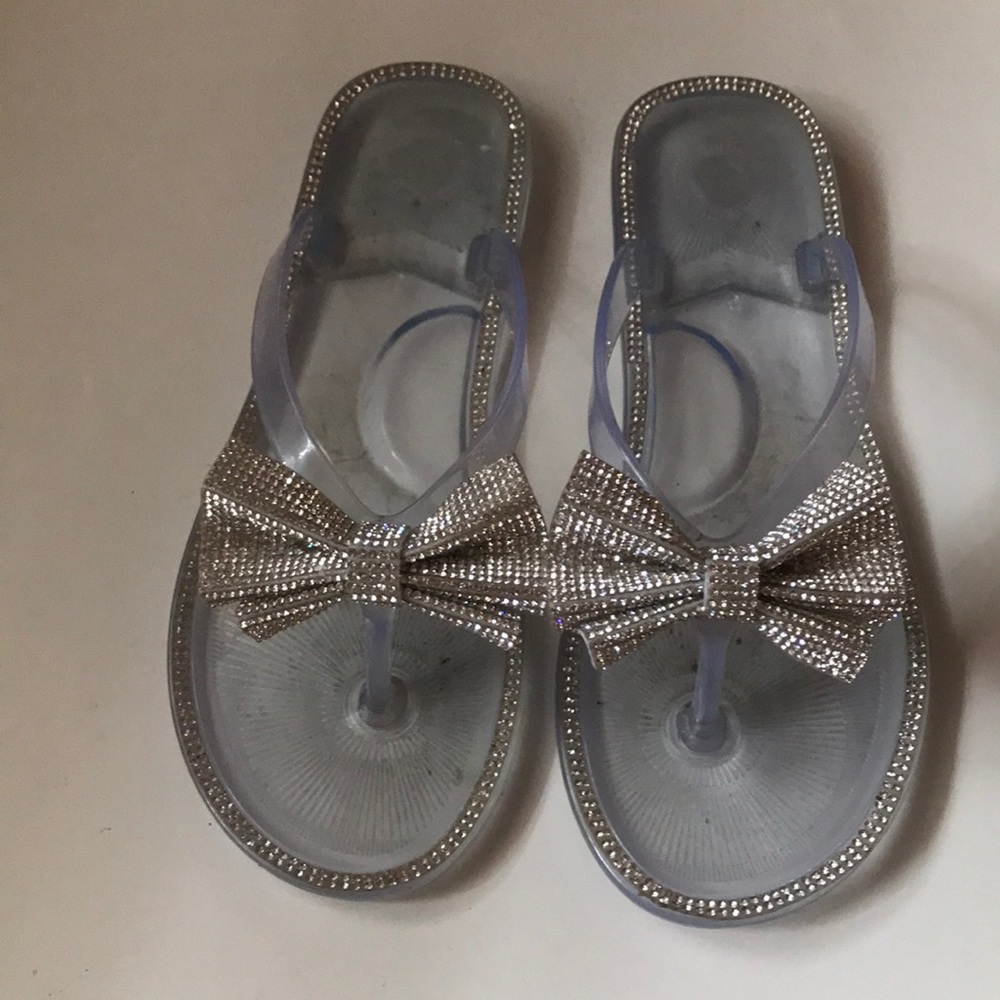 Clear jelly flip flops with sparkly bows